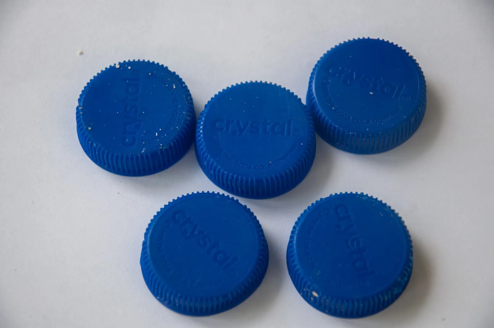 Plastic bottle caps sorted by color