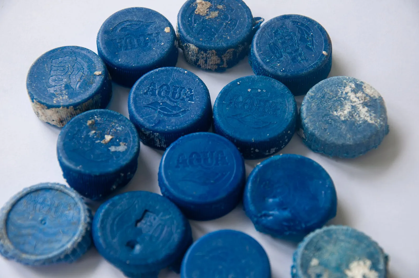 Aqua bottle caps sorted